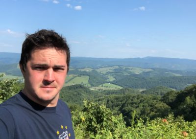 A panoramic view of the rural Appalachian mountains where Americans Helping Americans serves low-income communities.