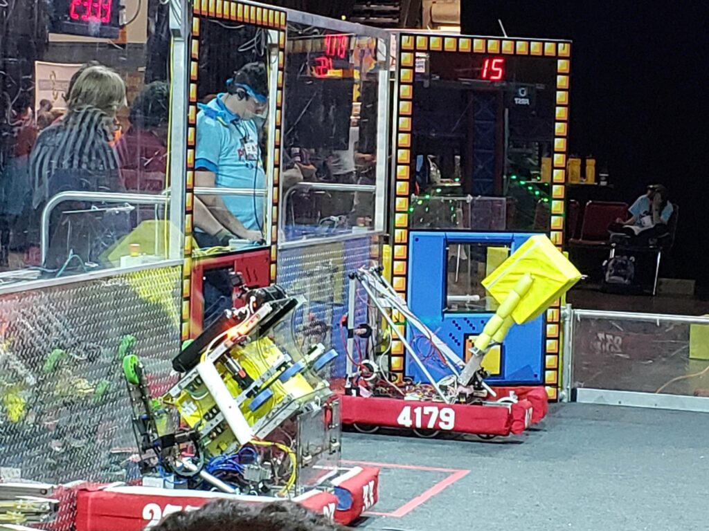 Tahisco Tech Robotics Team students competing with custom robots at the Inaugural Tallahassee Regional.