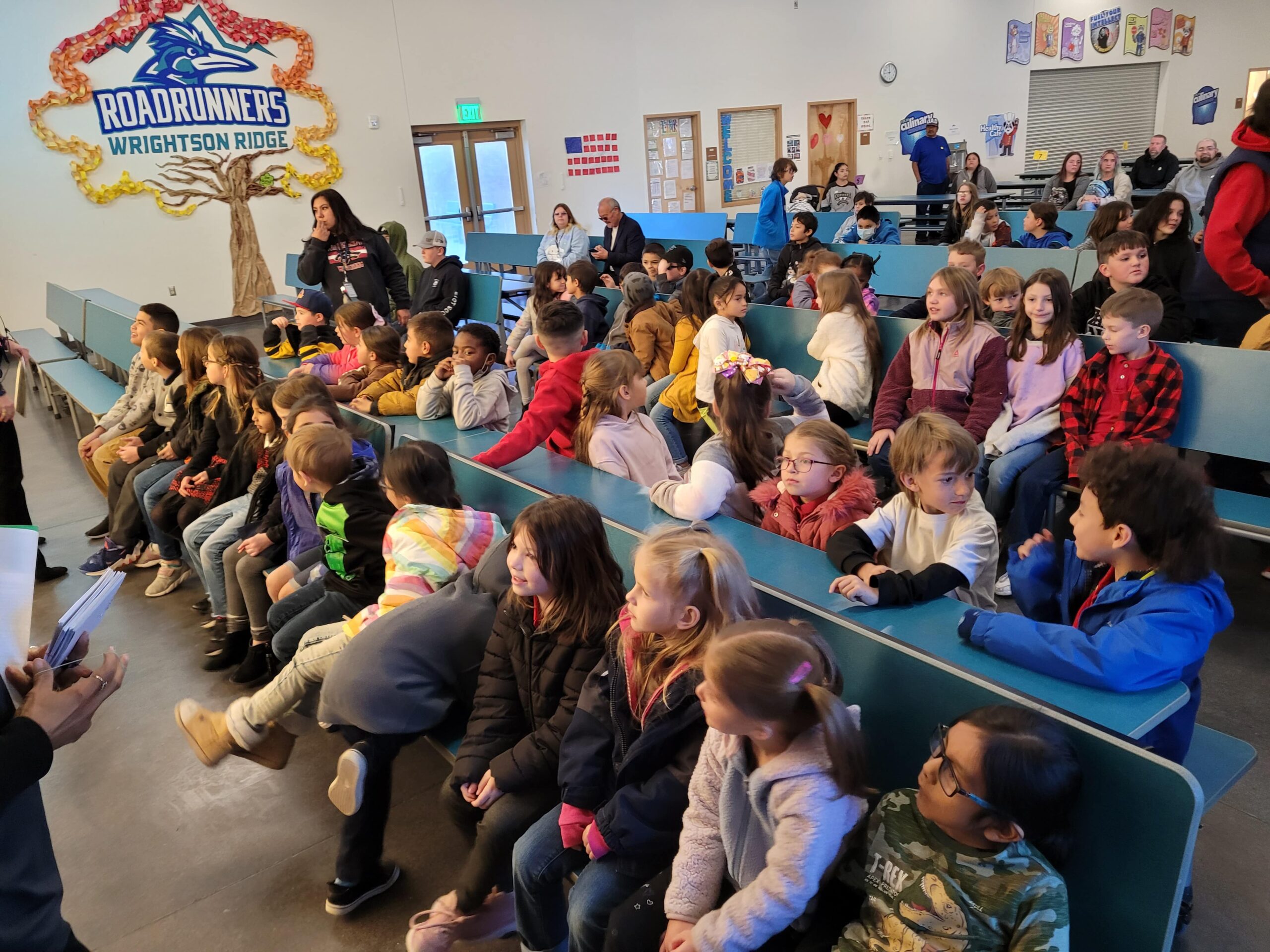 Students receiving laptops through our education programs in the Appalachia.