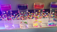 Touch-sensitive sensory lights and liquid motion timers used as calm down tools for students in Appalachia.