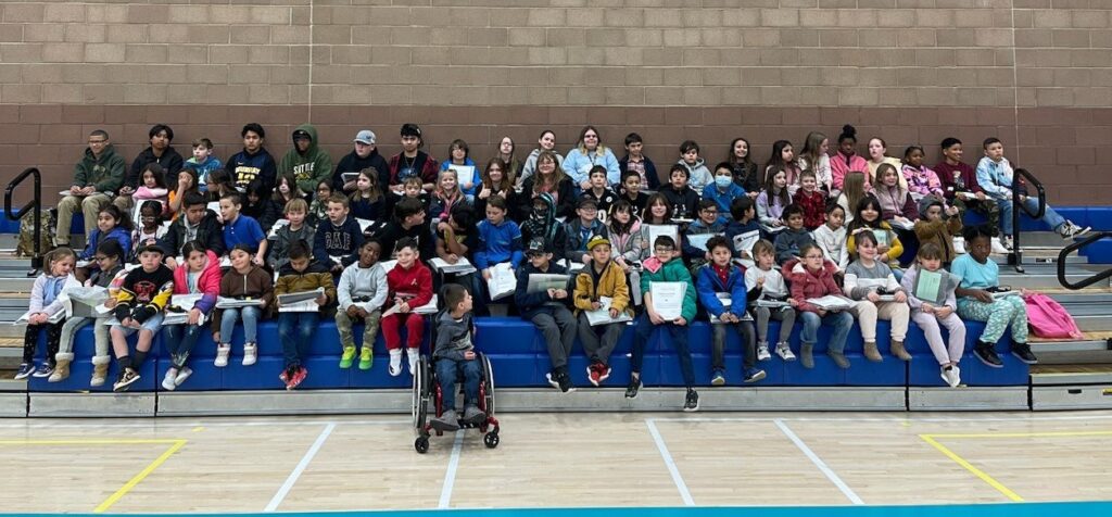 100 students at Wrightson Ridge Elementary receive laptops from Americans Helping Americans and Laptops 4 Learning.