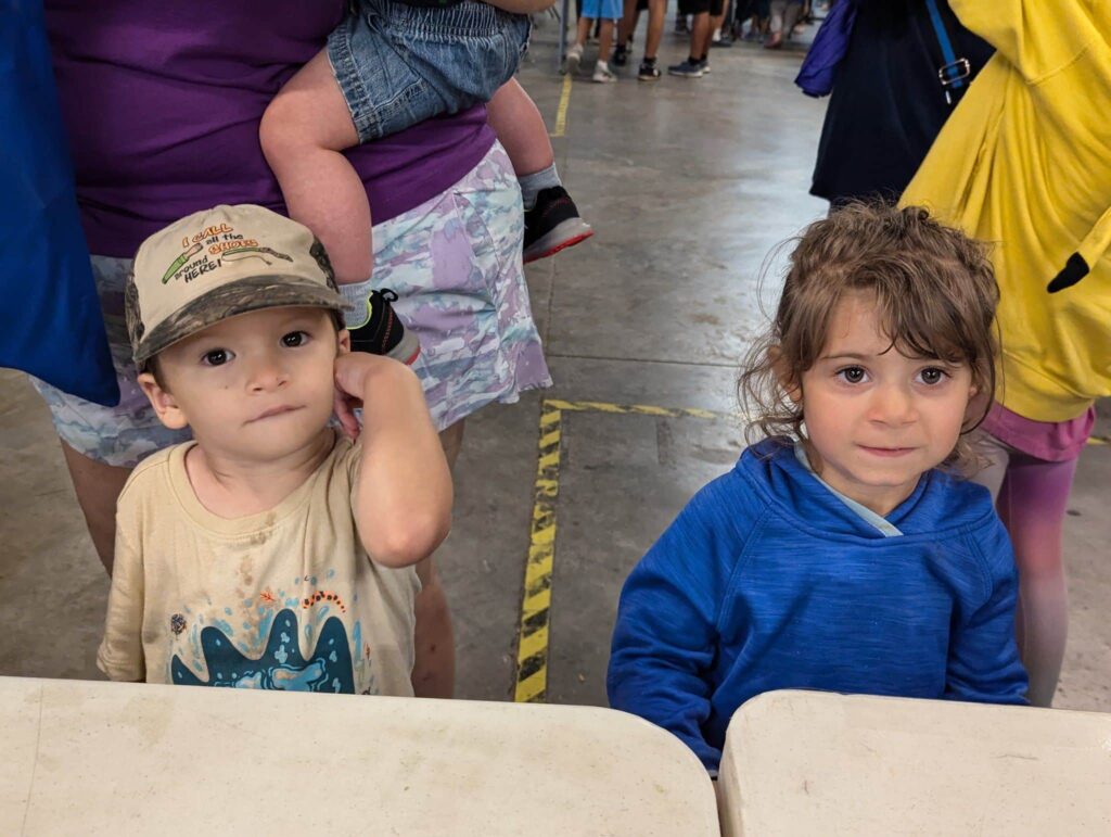 Two young children participate in the annual Back to School Bash hosted by Appalachian Ministries of the Smokies.