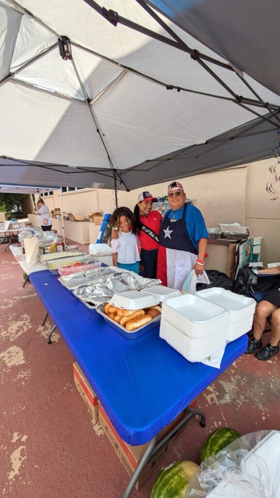 August Hero of the Month Wendy Franklin serving food at a LAMP Ministries community event in Gainesville, Georgia.