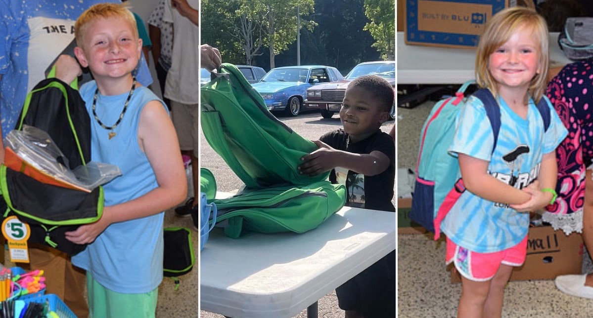Appalachian children smiling with new backpacks and school supplies from Americans Helping Americans back-to-school program