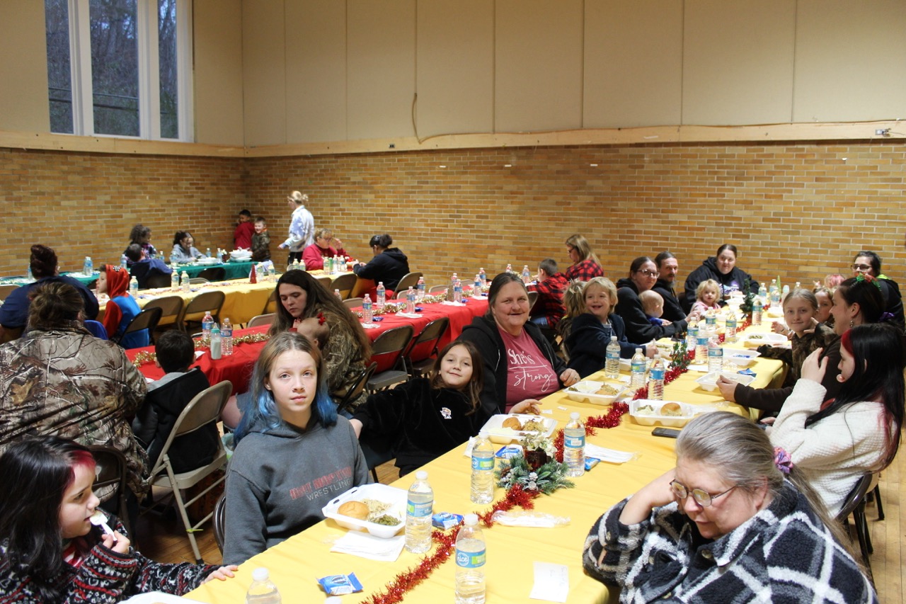 Holiday community dinner in McDowell County McDowell County families sharing a holiday meal hosted by Big Creek People in Action and Americans Helping Americans