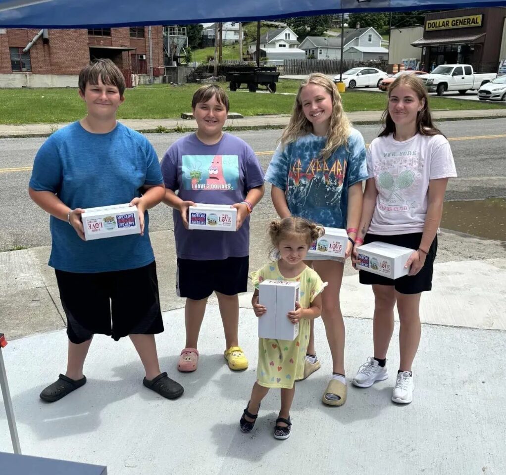 Appalachian children with food bank boxes