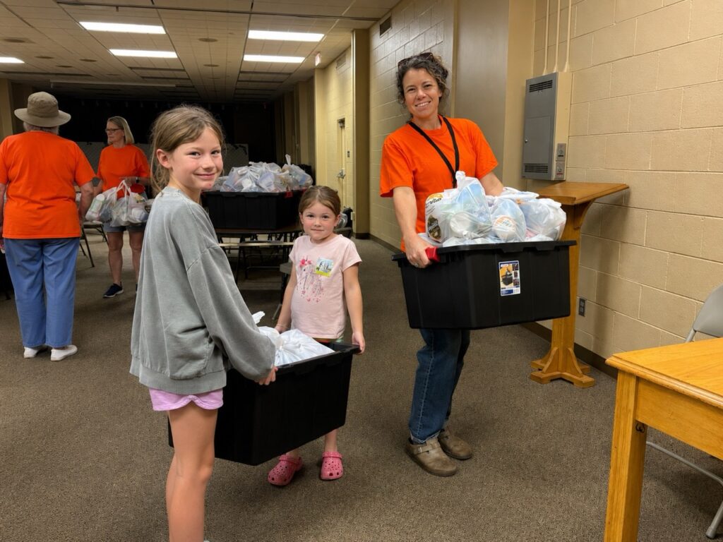 AMOS volunteers deliver Lunch Box program meals to children and families in Appalachian Tennessee